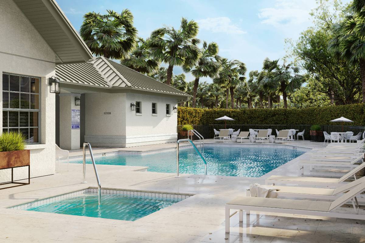 Resort-style community pool with pool house and lounge chairs in Naples, Florida